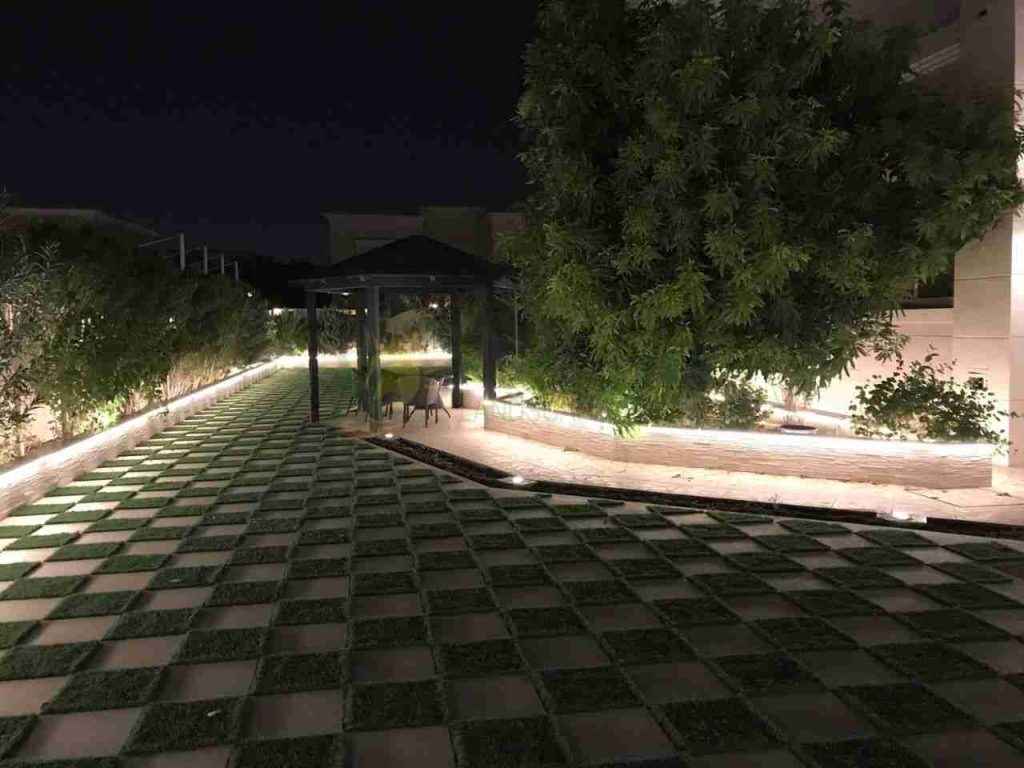 gazebo in a paved backyard