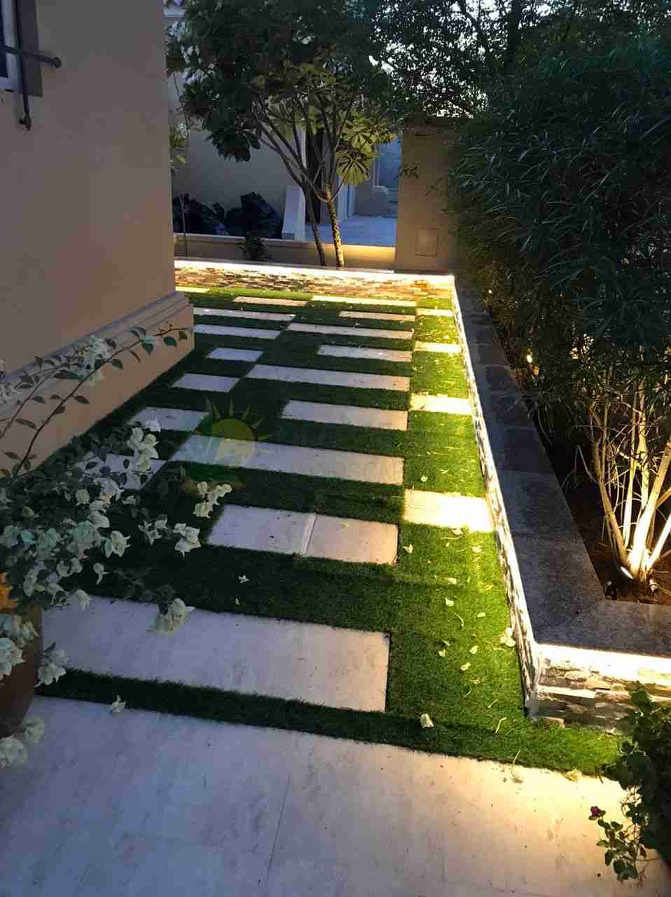 paved walkway in lawn