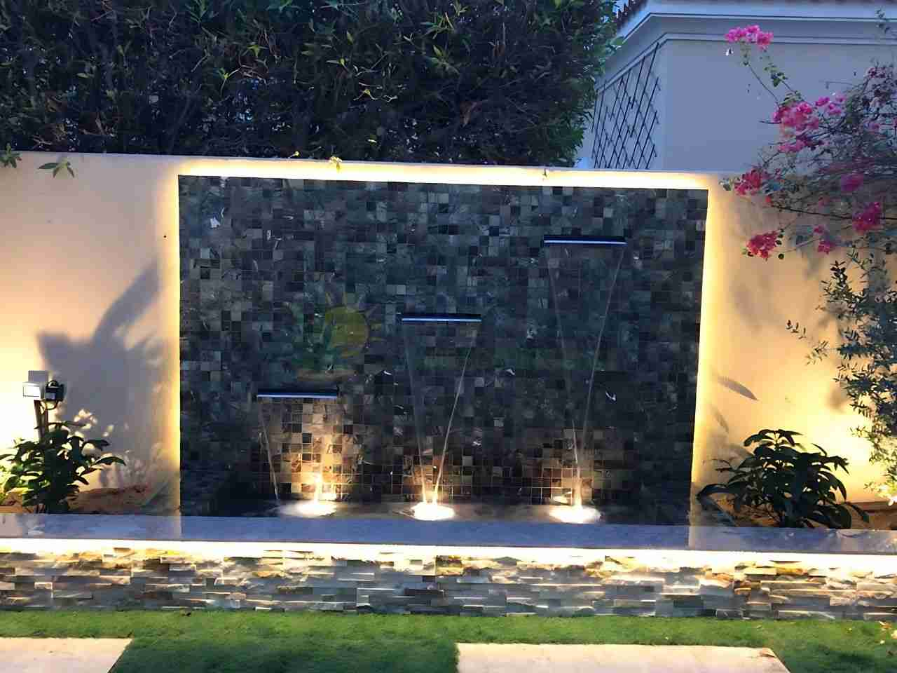 decorated water feature in backyard