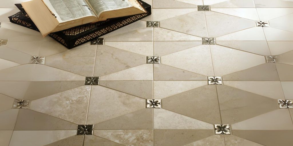 metallic accent tile in garage and a book is placed on the floor