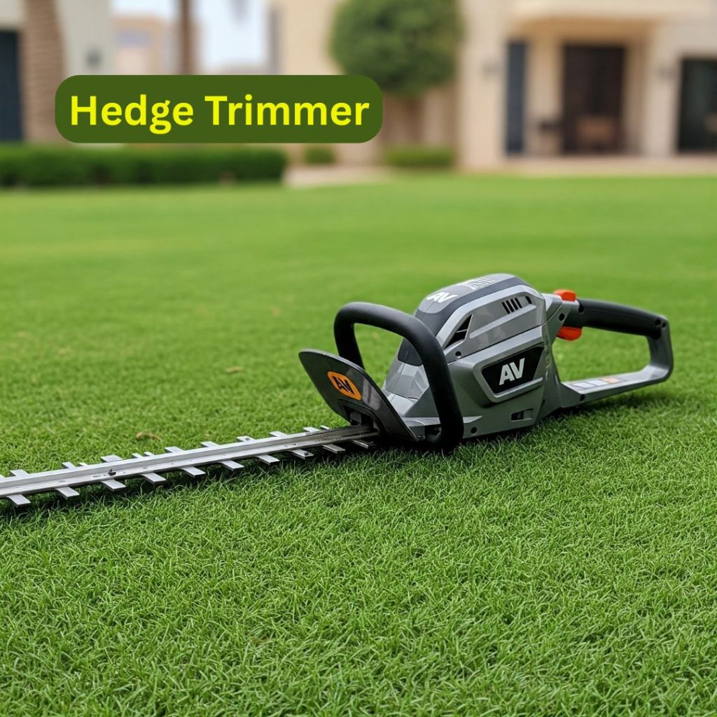 Garden Maintenance Tools List to Buy in UAE 7 A powerful, clean hedge trimmer with the AV logo, positioned on a lush luxury lawn in a contemporary UAE garden. Perfect for shaping hedges and shrubs.