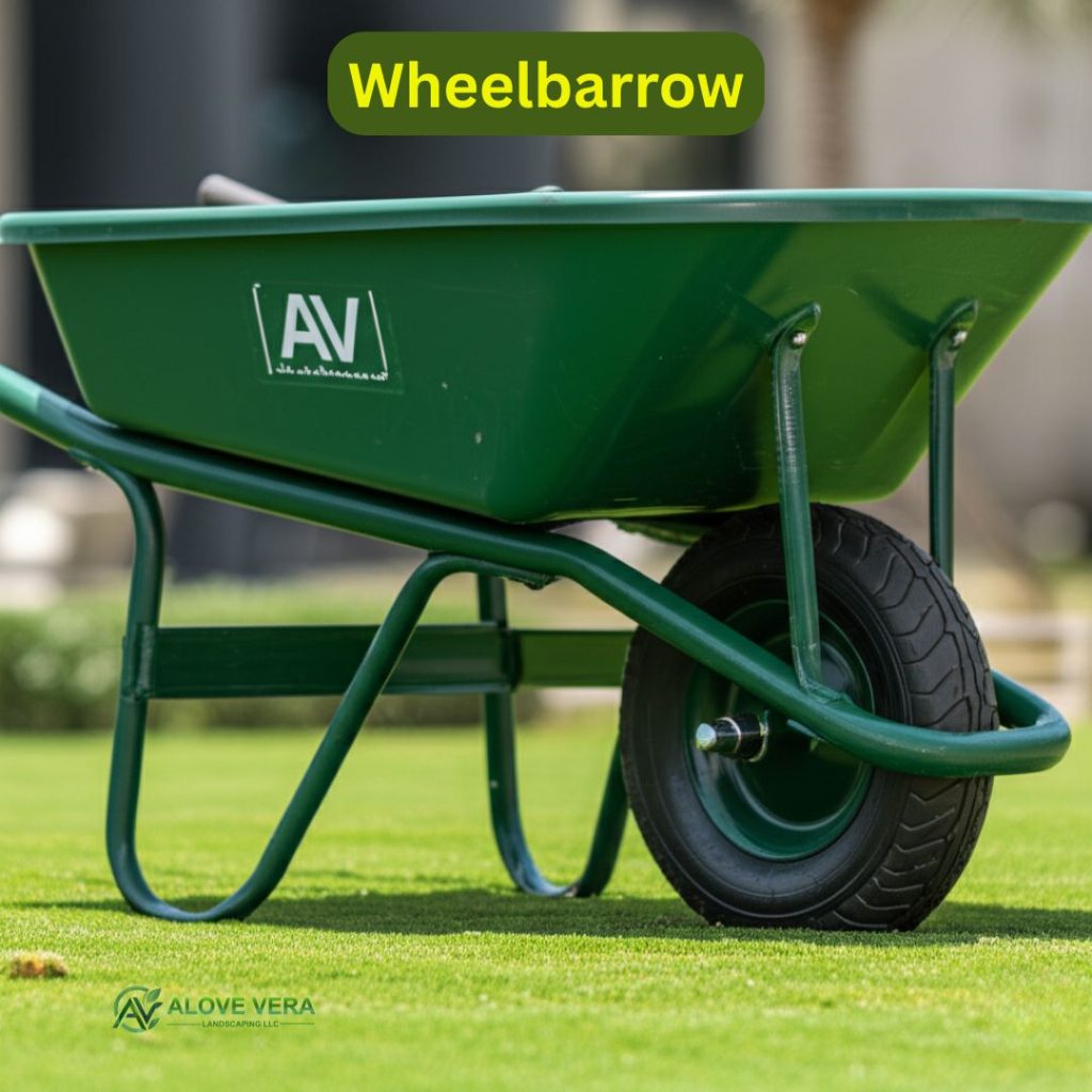 Garden Maintenance Tools List to Buy in UAE 9 A new, clean wheelbarrow with the AV logo prominently displayed, parked on a lush luxury lawn in a modern UAE villa garden. Ideal for transporting garden materials.