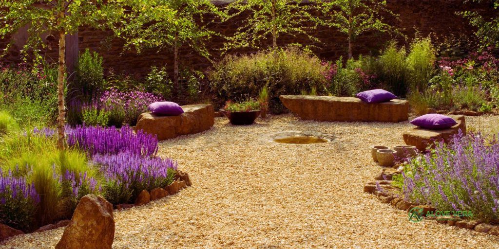 Best Large Round Rocks for Landscaping in Dubai 4 Large round rocks for landscaping with purple flowers